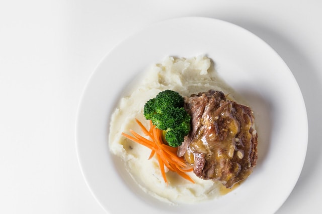Pressure Cooker (Instant Pot) Honey Orange Pork on a white plate