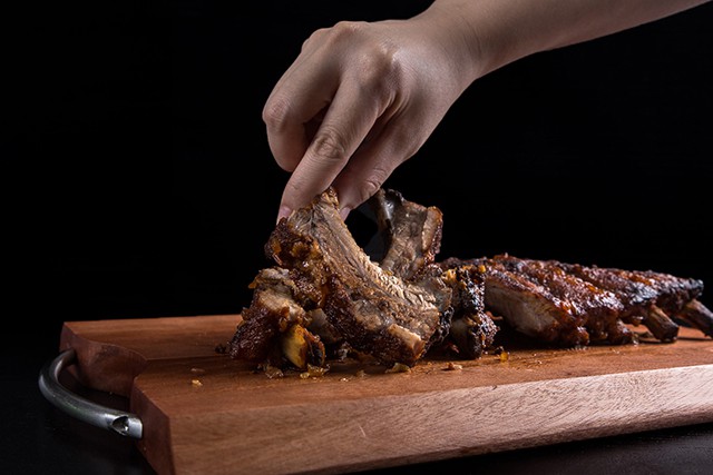 Pressure Cooker Ribs on a cutting board