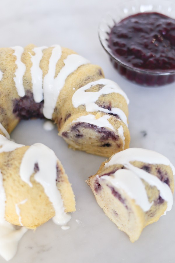 Berries and Cream bundt-style Breakfast Cake with a slice removed