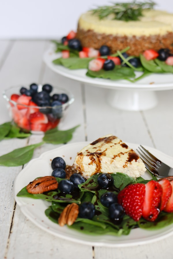 Pressure Cooker Savory Blue Cheese Cheesecake with a strawberry spinach salad and drizzled with a sweet balsamic vinaigrette.