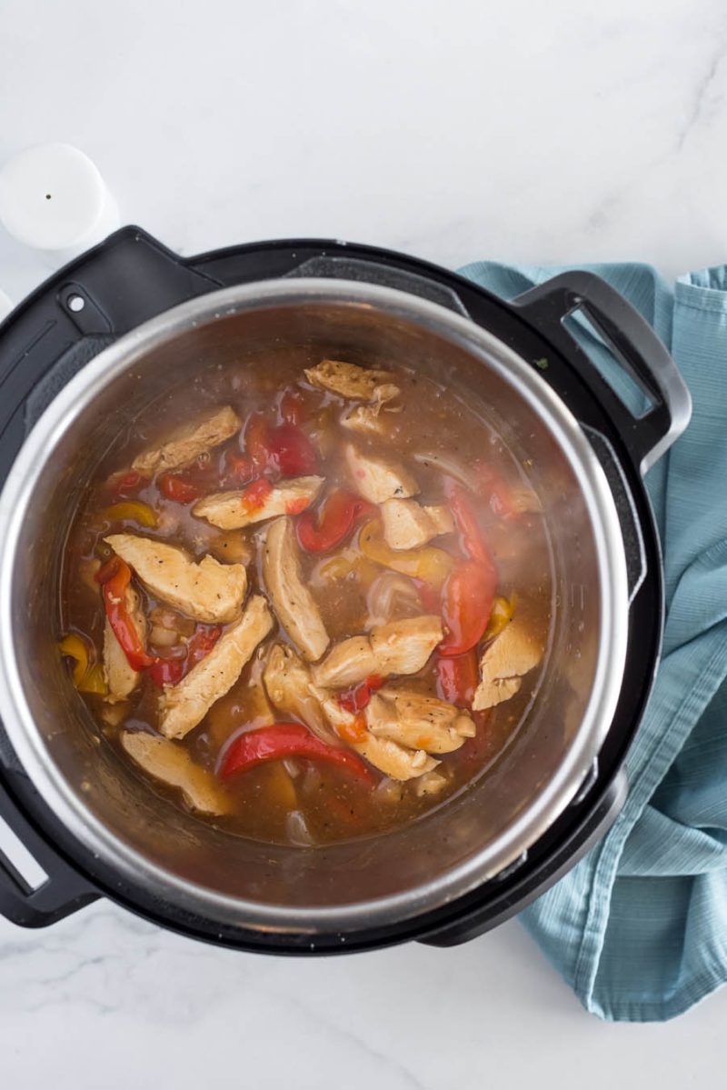 An overhead shot after cooking of the fajitas, before all the liquid has cooked down