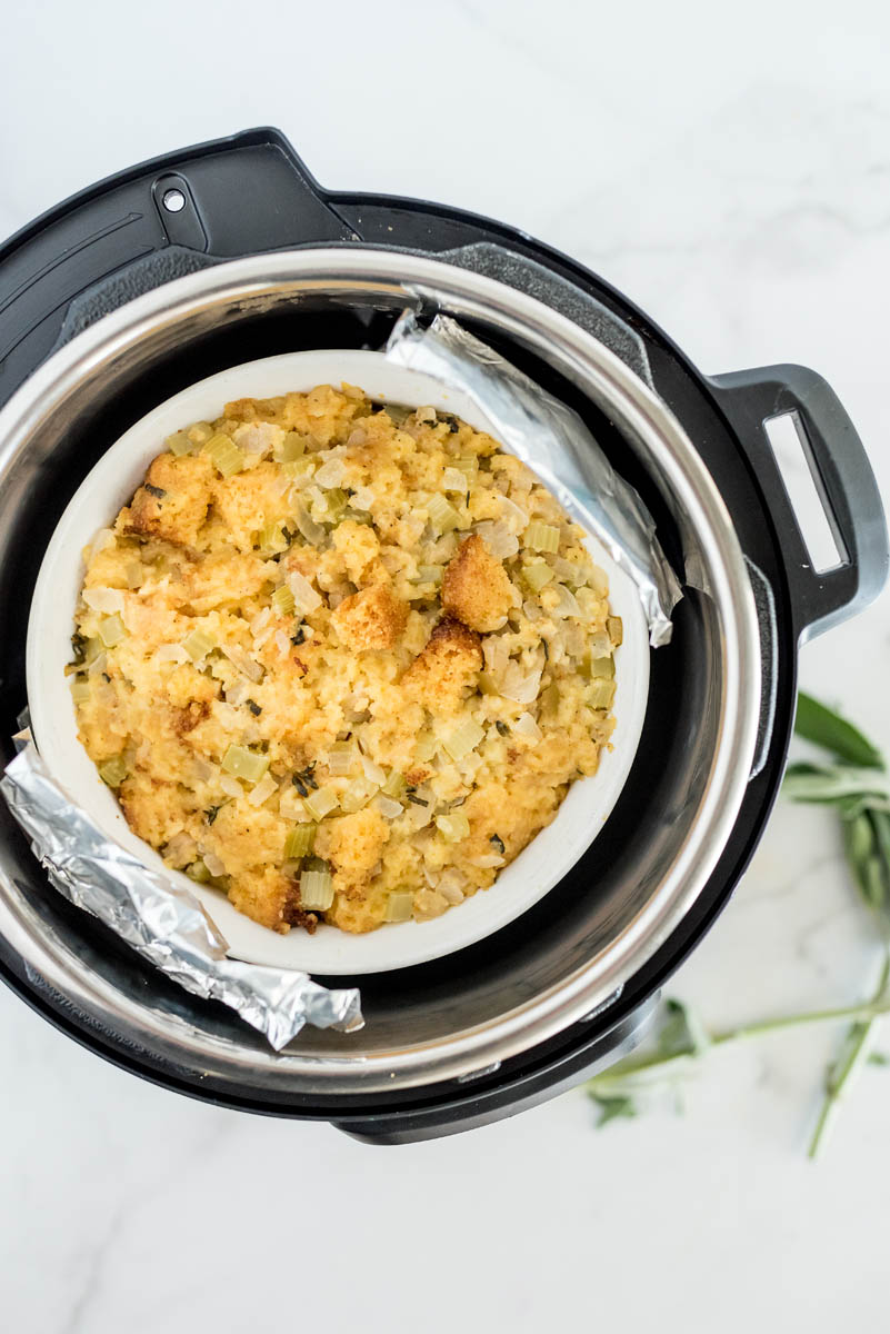 Overhead picture of corn bread dressing after being cooked in an Instant Pot.