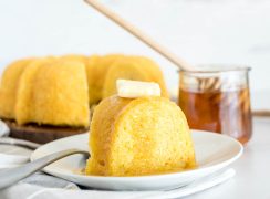 slice of jiffy cornbread with maple syrup and butter