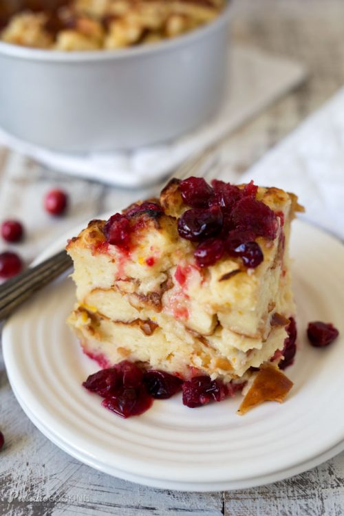 Cranberry-Orange-Baked-French-Toast-Sliced on a white plate