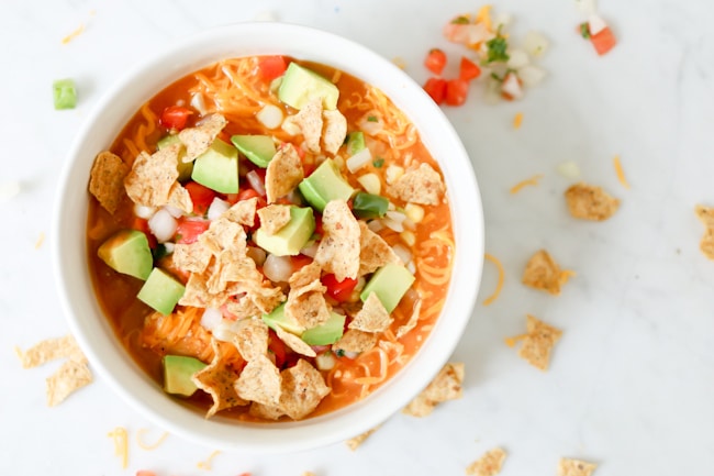 white bowl of Pressure Cooker (Instant Pot) Creamy Enchilada Soup