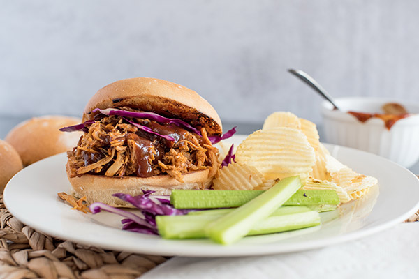 plated Instant Pot Pulled Pork sandwich