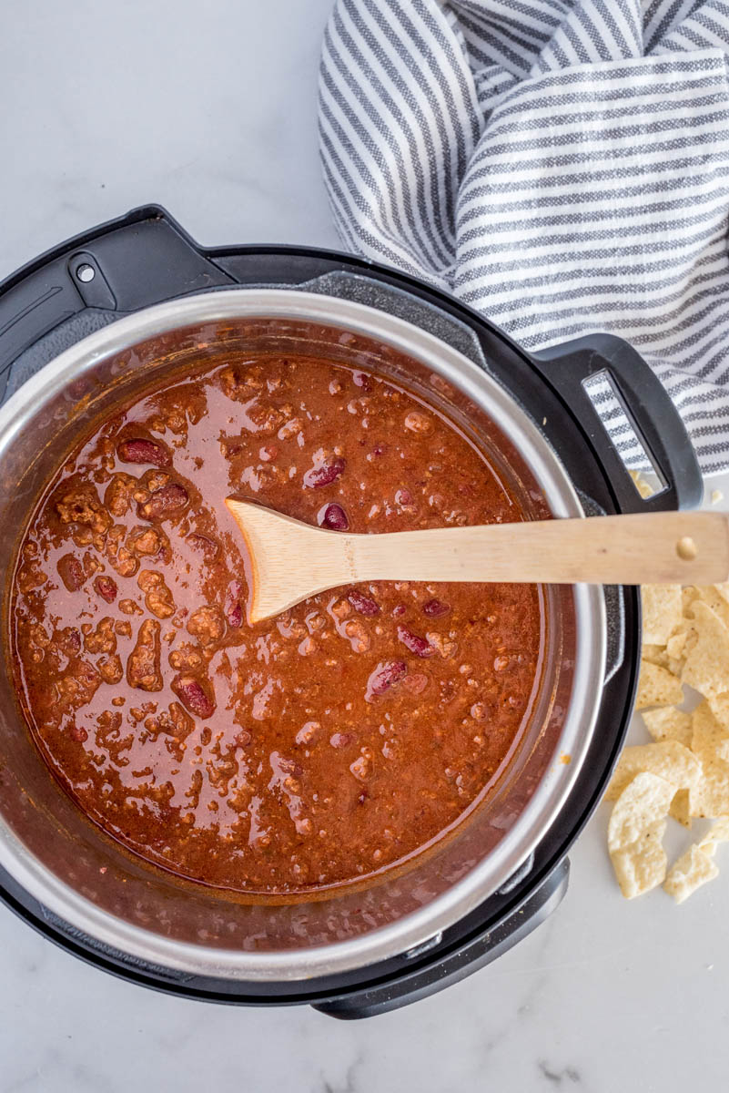 An overhead shot of ground beef chili after pressure cooking inside of an Instant Pot