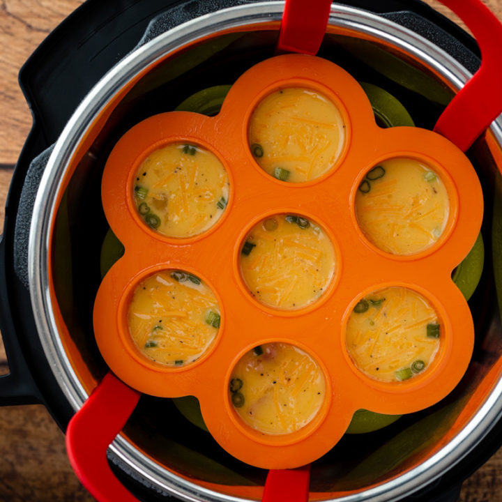 Stacked silicone trays in the Instant Pot for making Pressure Cooker Egg Bites