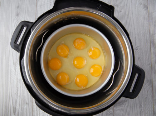 Pressure Cooker Egg Loaf with the eggs inside the cake pan in the Instant Pot