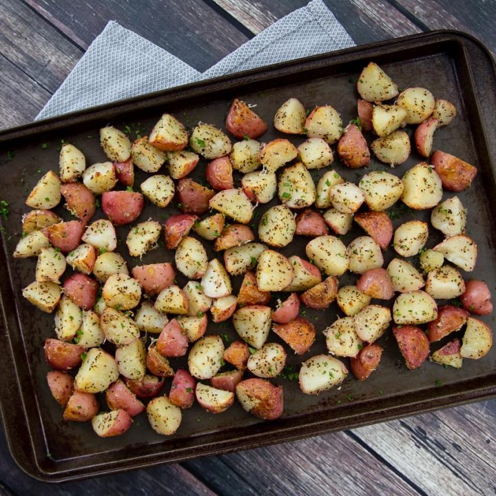 A sheet pan with Instant Pot garlic roasted red potatoes