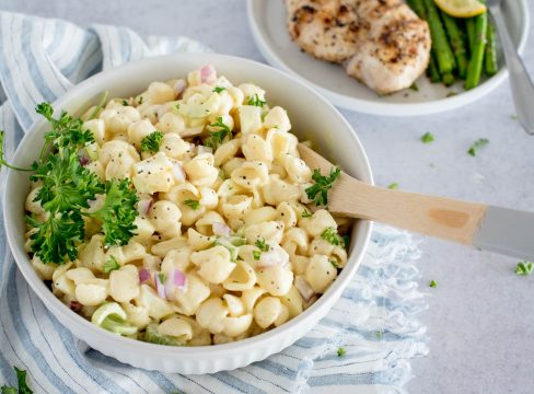 white bowl of amish potato and pasta salad