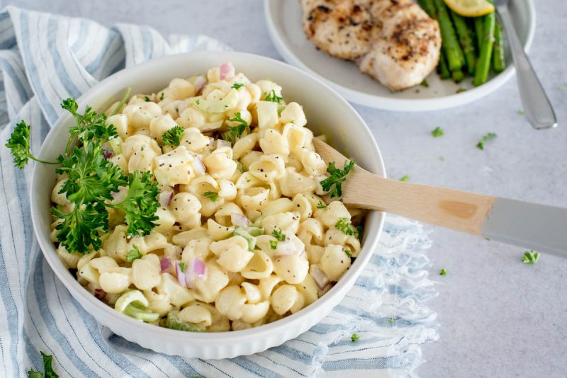 white bowl of amish potato and pasta salad