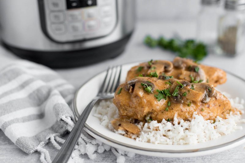 chicken in mushroom sauce in front of an instant pot