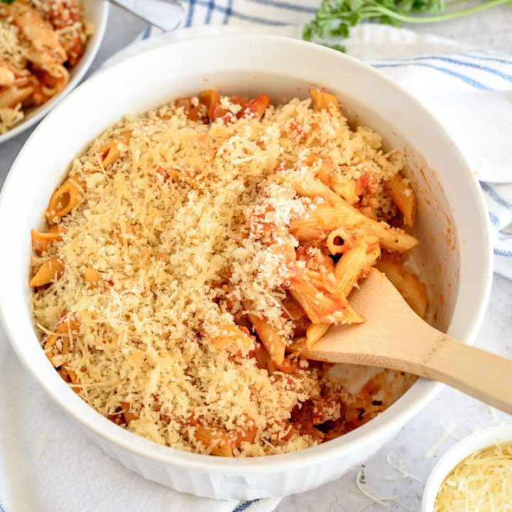 Instant Pot eggplant parmigiana in a ramekin topped with panko bread crumbs and ready to serve