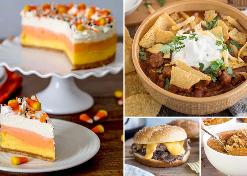a collage of four recipes featured in the Halloween recipe roundup: on the left is a slice of candy corn cheesecake, colored in the classic candy corn colors, then on the top right is a yellow bowl of chili garnished with yellow tortilla chips and sour cream and cilantro, on the bottom middle is a steak and cheddar sandwich with lots of yellow cheese sauce dripping under the bun, and then the bottom right is a bowl full of Instant Pot pumpkin pie steel cut oats