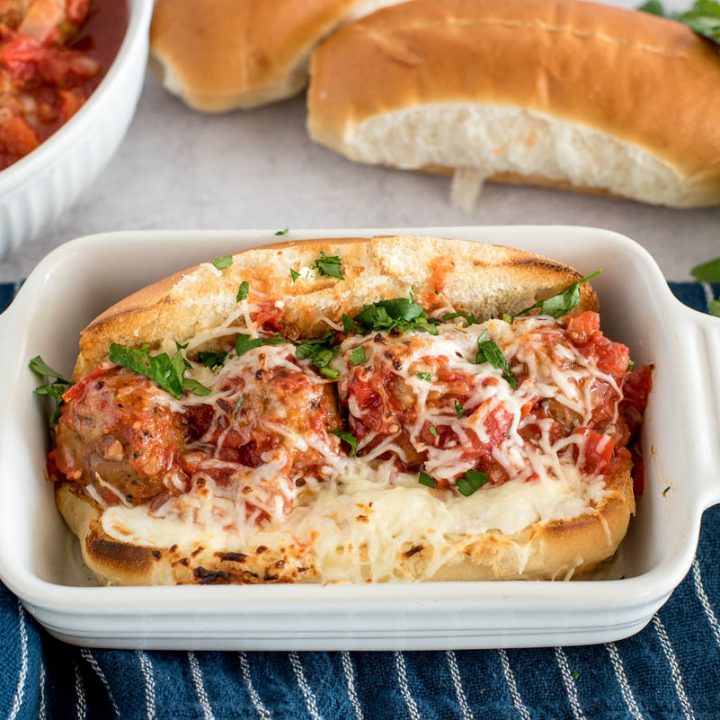 meatball sub made in a pressure cooker in a white baking dish