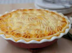 Instant Pot shepherds pie topped with mashed potatoes and browned in the oven.