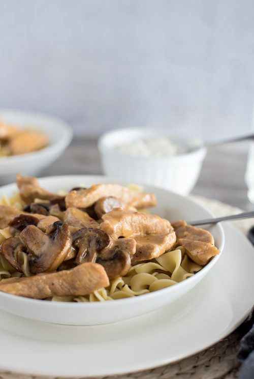 Instant Pot PorkbStroganoff in a white bowl ready to eat