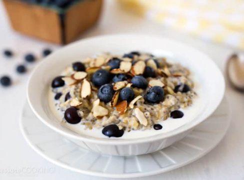 Pressure Cooker (Instant Pot) Lemon Blueberry Steel Cut Oats in a white bowl