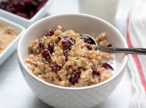 Lemon-Cranberry-Breakfast-Farro in a white bowl