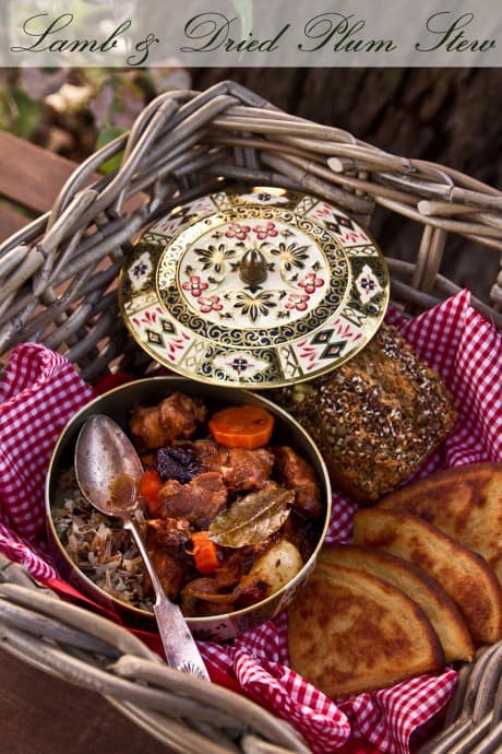 Pressure Cooker ((Instant Pot) Lamb Stew with Dried Plums in a decorative pot with a spoon