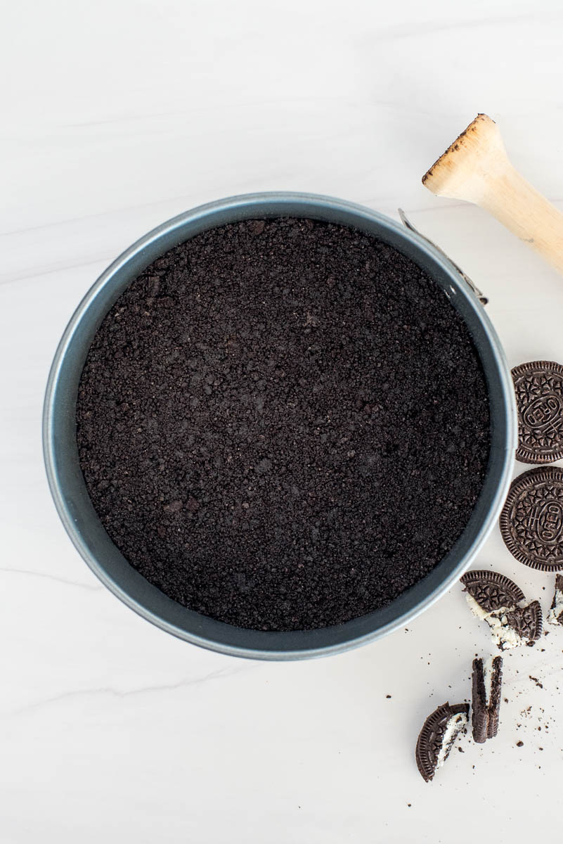 oreo cookie crust in a springform pan