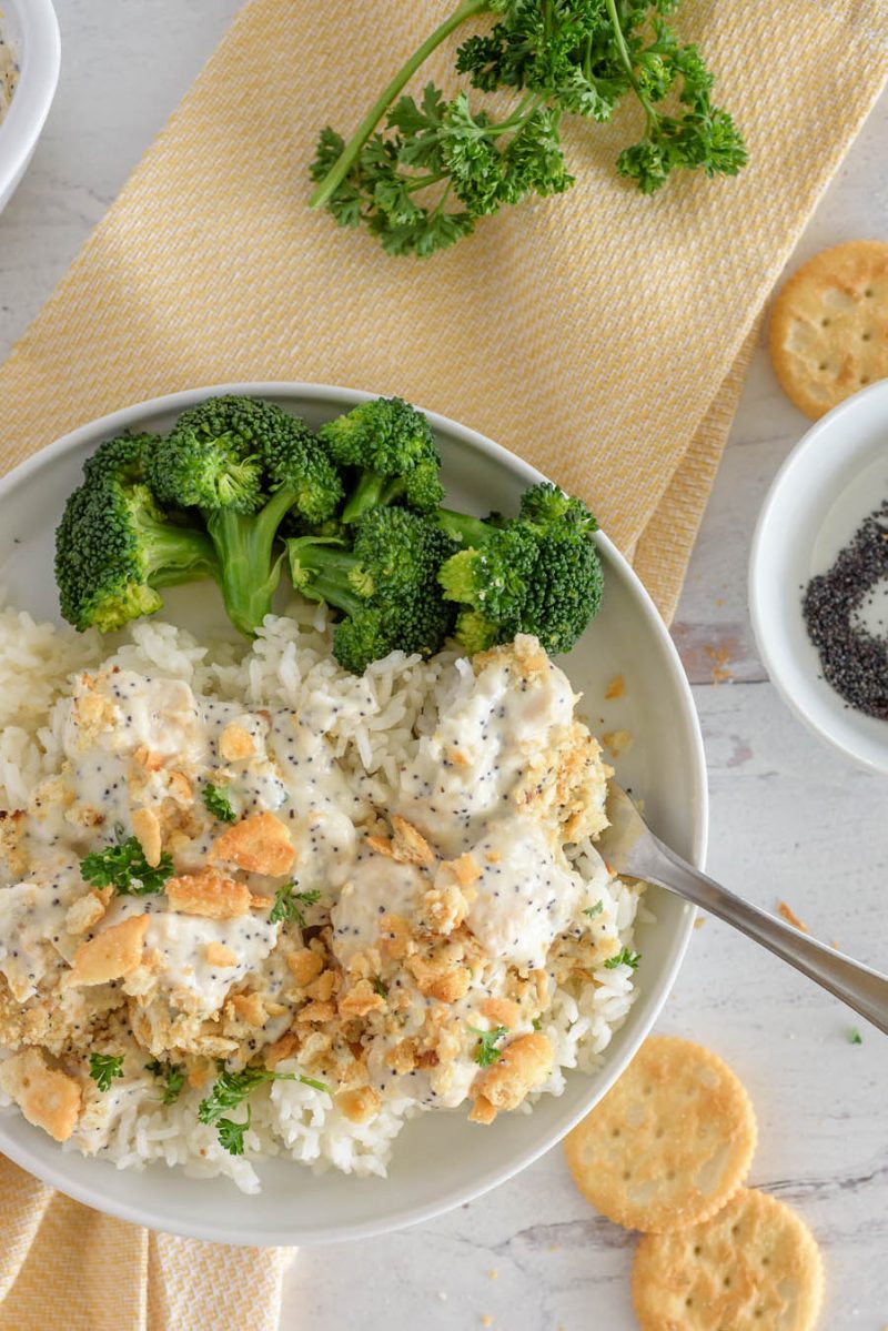 An overhead shot of a white plate filled with poppyseed casserole