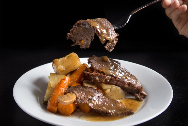 Pressure Cooker Pot Roast on a white plate 