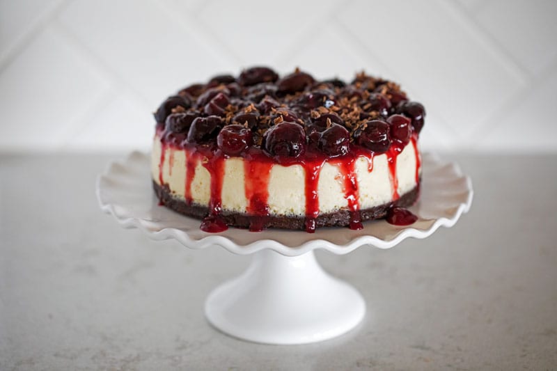 Pressure Cooker (Instant Pot) Black Forest Cheesecake on a white cake stand