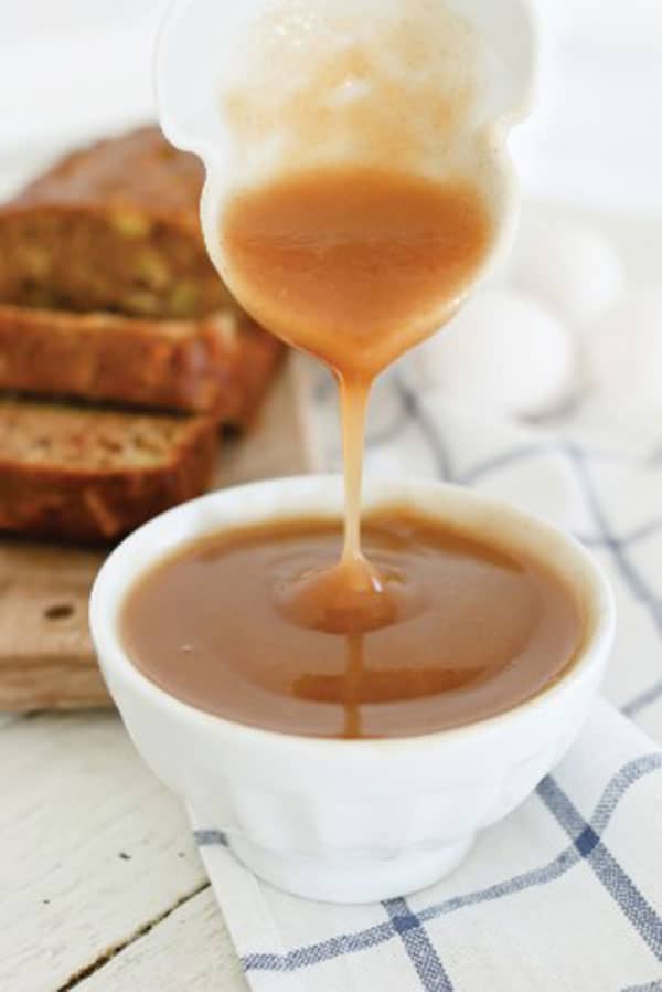 bowl of homemade coconut vanilla syrup, made in an electric pressure cooker