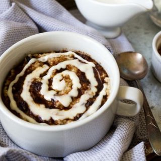 Pressure Cooker (Instant Pot) Cinnamon Roll Steel Cut Oats in a white bowl