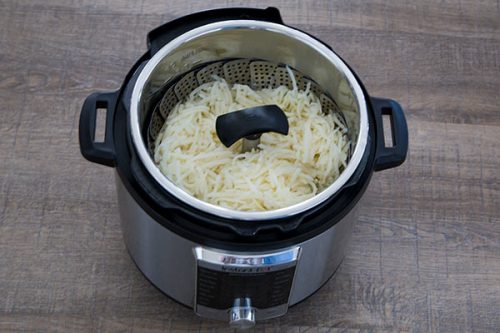 Steamer basket for making pressure cooker Hash Brown Potato Casserole.