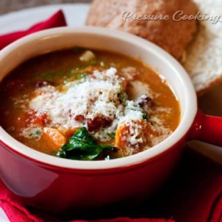 Pressure Cooker (Instant Pot) Minestrone Soup with Basil Pesto in a red bowl