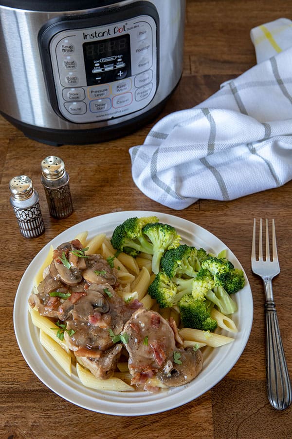 Pork-Tenderloin-Marsala-Penne over noodles with broccoli on the side