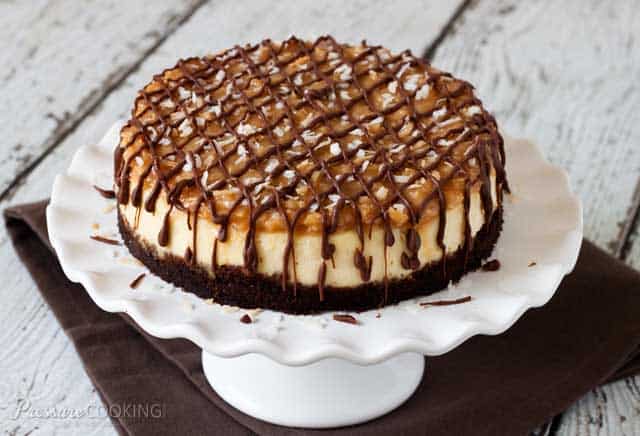 Pressure Cooker (Instant Pot) Samoa Cheesecake on a white cake stand