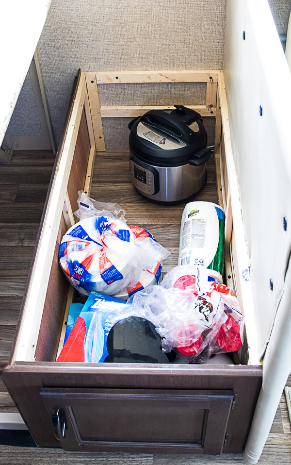 Instant Pot Duo fits perfectly under the dining seat of an RV