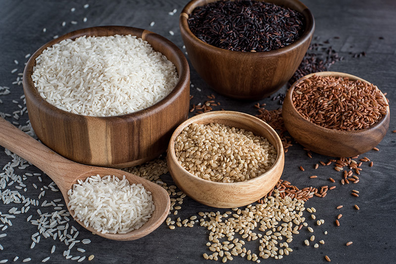 White rice, brown rice, black rice, and pink rice, ready to go in the Instant Pot