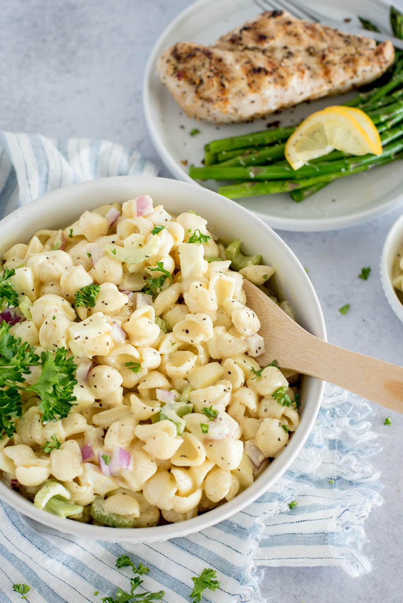 white bowl of amish potato and pasta salad