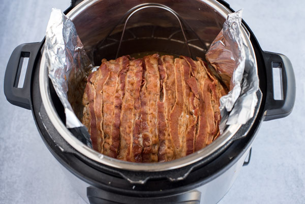 Pressure cooker meatloaf loaded and ready to cook in an Instant Pot.