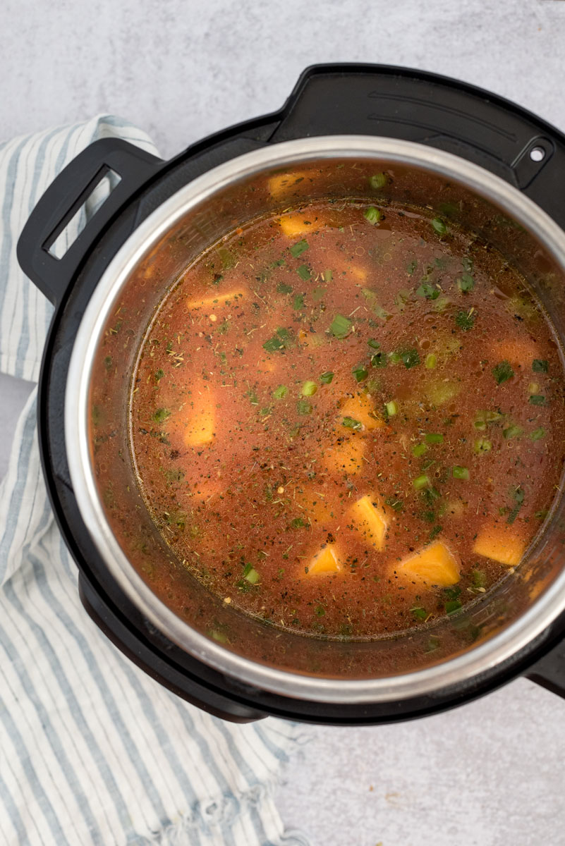 all of the ingredients together ready to pressure cook in the Instant Pot