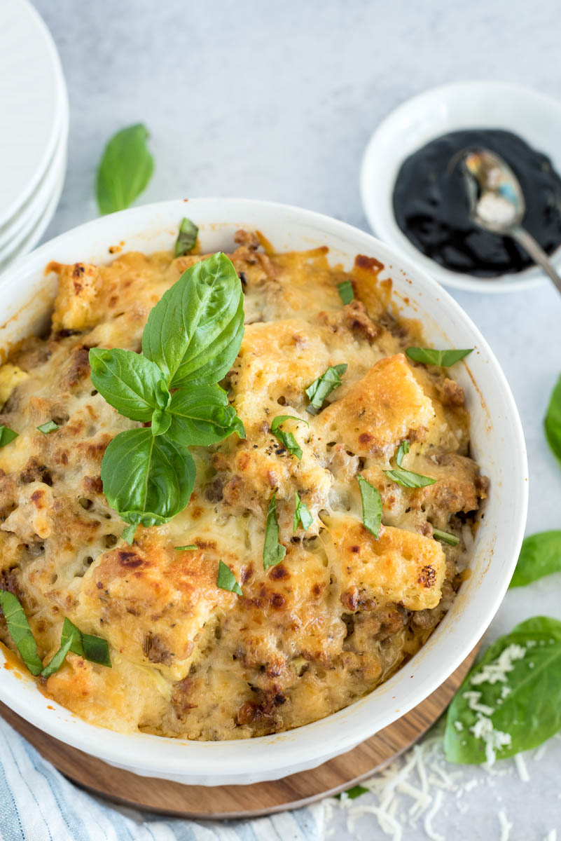 close up on a baked caprese breakfast casserole