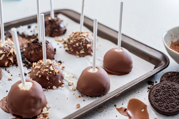 How to dip cheesecake bites by using a lollipop stick.