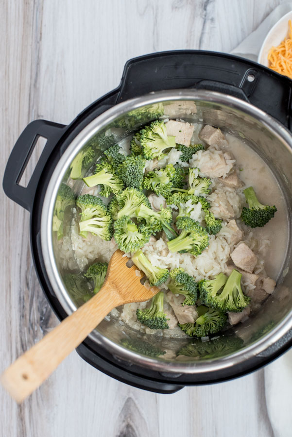 overhead view of Cheesy chicken and broccoli casserole in the Instant Pot when it is finished cooking.