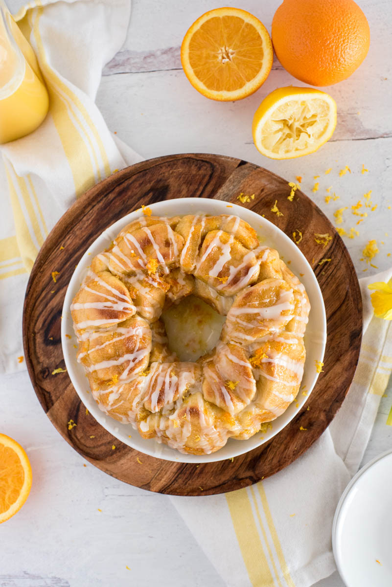 overhead of a bundt pan monkey bread with orange slcies