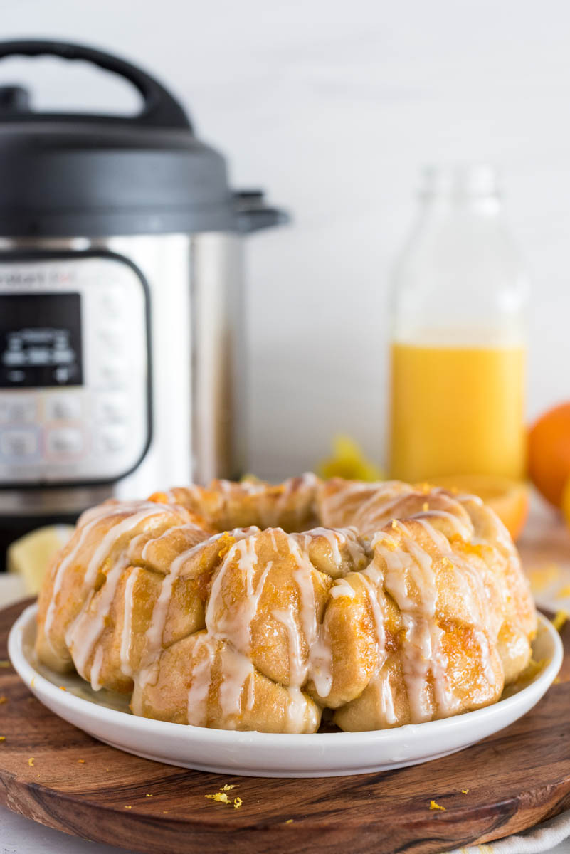 bundt pan ring of citrus monkey bread in front of an instant pot pressure cooker 