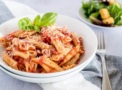 A close-up of Instant Pot Quick Marinara Sauce and Penne Pasta