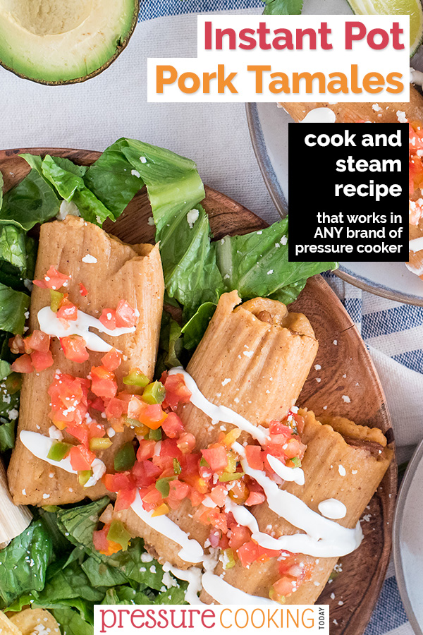 An overhead shot of Instant Pot tamales on a plate with lettuce, tomatoes, and sour cream.