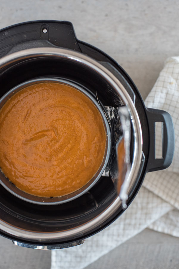 Pumpkin pie in a spring from pan inside an Instant Pot.