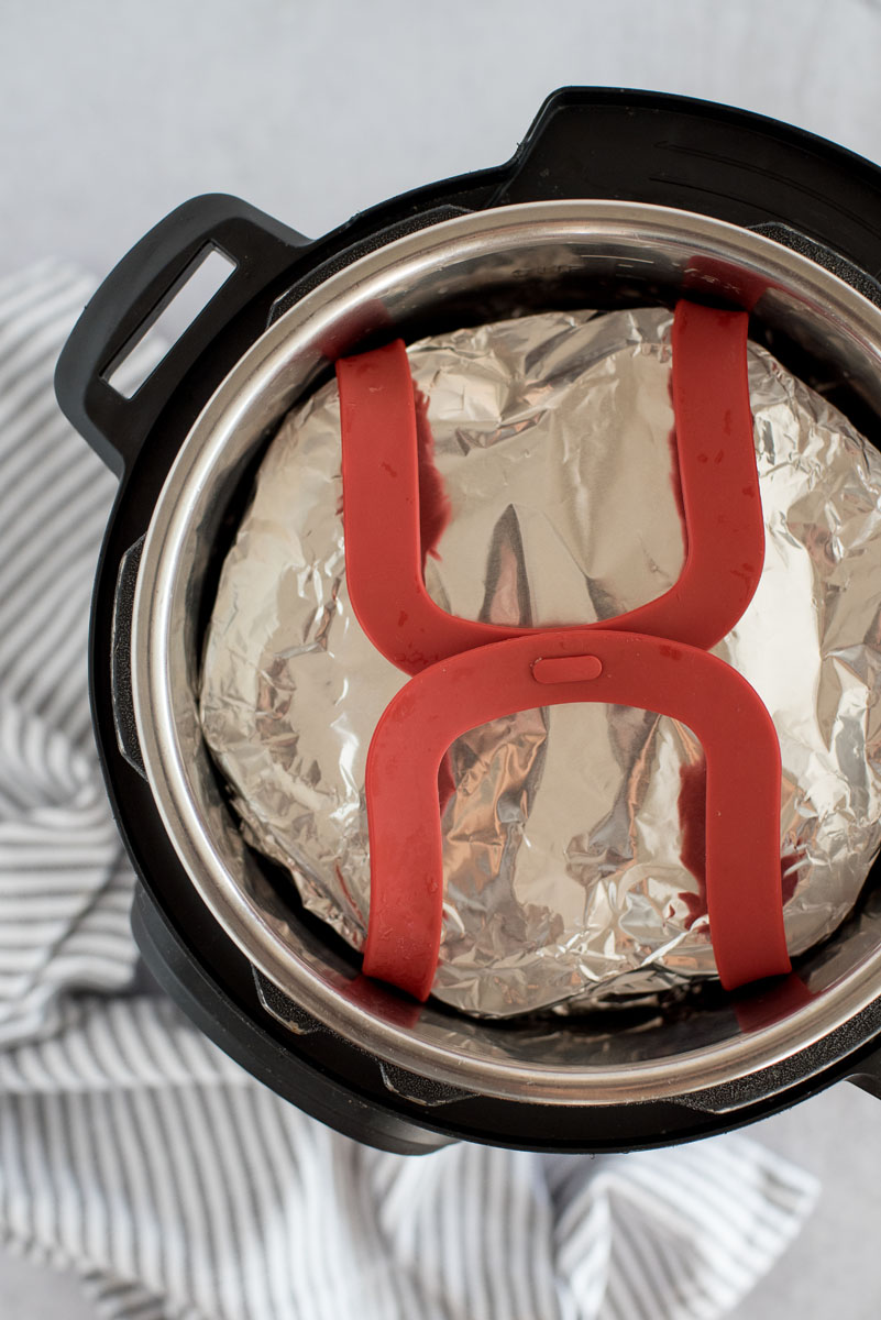 instant pot with a tin-foil wrapped silicone mold inside