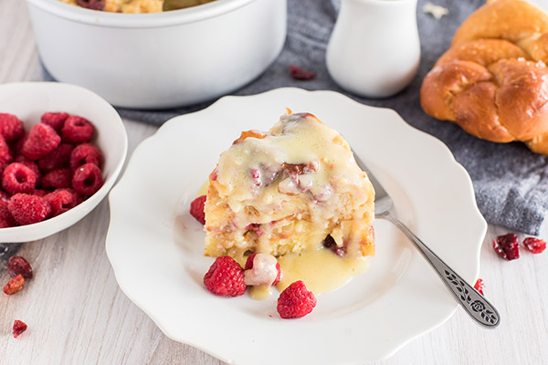 A plate of raspberry orange bread pudding